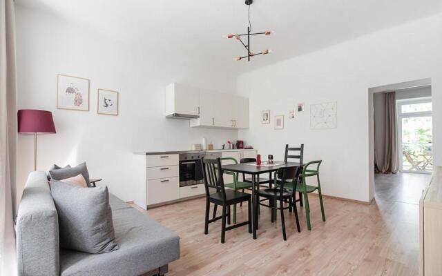 Colorful Apartment Facing Green Courtyard