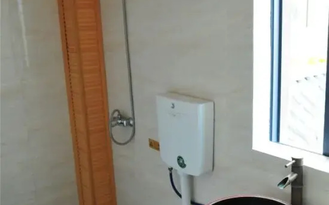 Dali Shuanglang Suiyuanju Inn