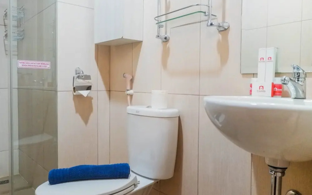 Homey 2BR Apartment at Tamansari Papilio