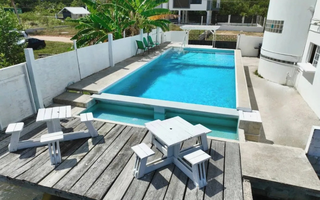 See Belize Waterside Sea View 2-bedroom Apartment w Balcony, Pool & Deck 2nd FL