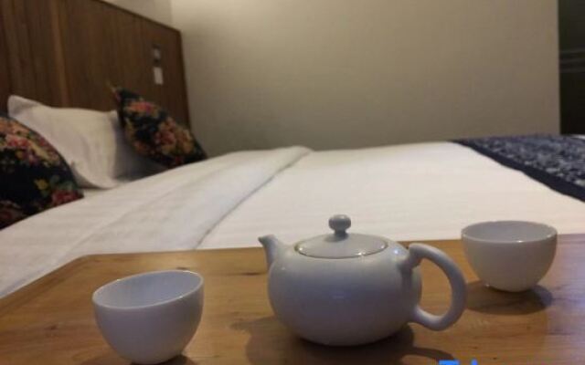 Sanqing Renjia Guesthotel