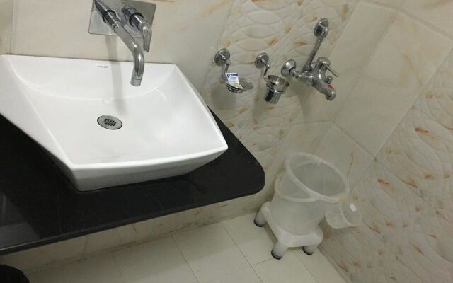 JK Rooms 101 Hotel Asian Inn