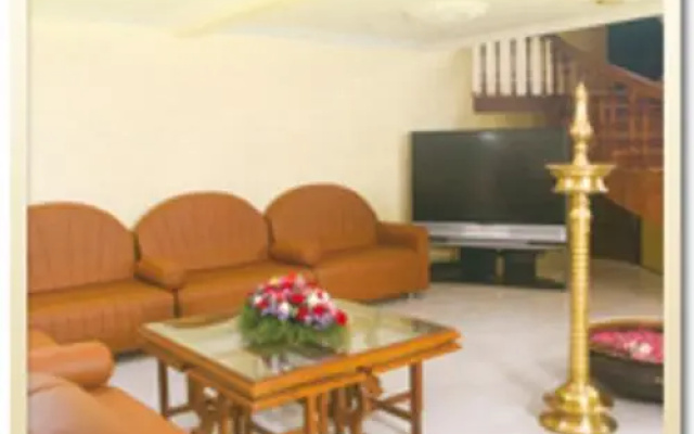 Varsha International – Guest Rooms – Pudukad