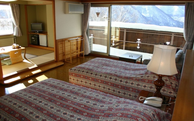 Hotel White Inn Kitashiga – Guest Rooms – Yamanouchi