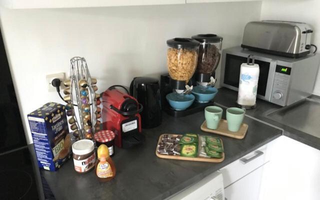 Appartement cozy: 10/15 min des Champs Élysée