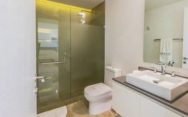 Contemporary Design Oceana 422 Playa del Carmen Condo by RedAwning