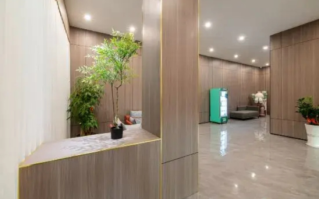 Kaman Hotel (Huazhou Bei'an Bus Station Zhouxuan Branch)