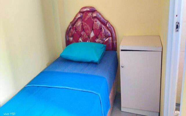 Spot On 91249 Baroqah Guest House