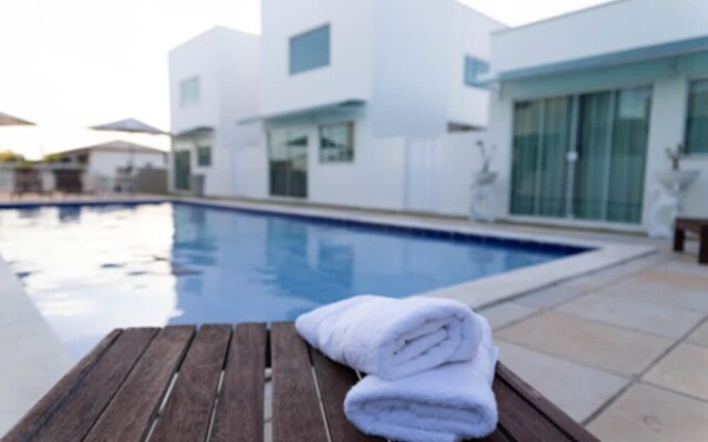 Chal com Mezanino 400m do mar e Jardim Privativo
