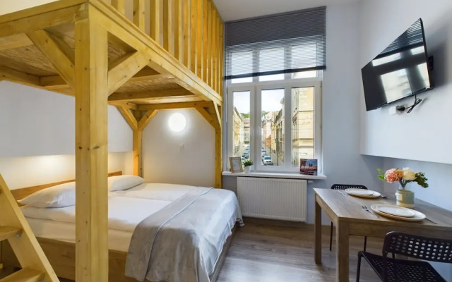Wooden Cracow Apartment by Renters