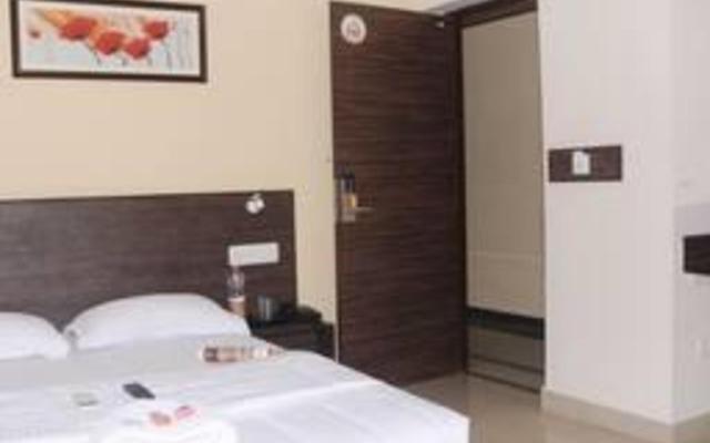 Orange inn Hotel Manapakkam