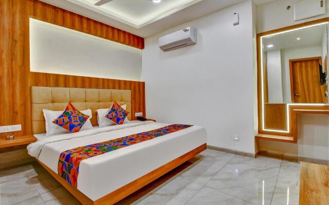 Fabhotel Prime Purple Orchid