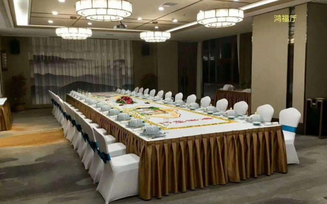 Xinzheng Xingangwanhua Hotel