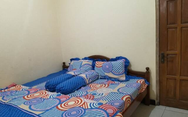 OYO Homes 91083 Desa Wisata Plosokuning Syariah