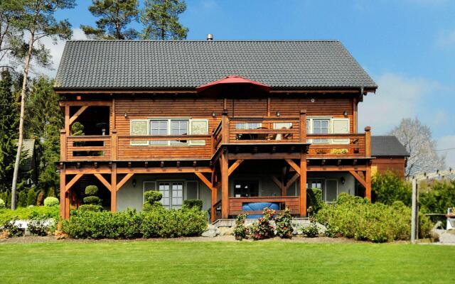 Affluent Chalet in Septon with Whirlpool, Sauna, Hot Tub