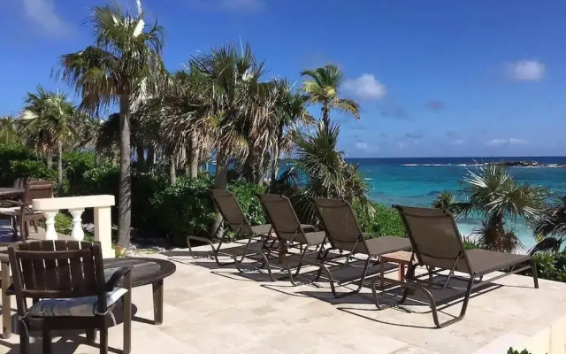 Seven Palms Serenity: Beachfront Oasis