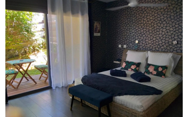 Suite INDIGO JACUZZI PRIVE PISCINE VUE MER acces cuisine laverie