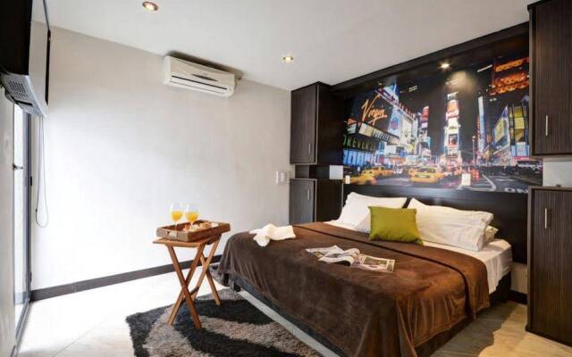 Poblado Suites