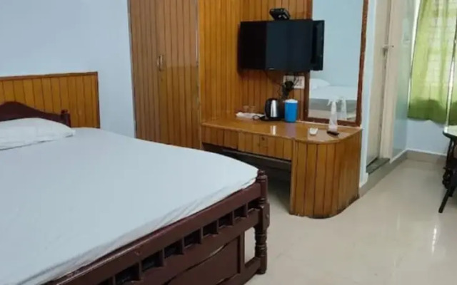 Goroomgo Kaveri Deluxe Lodge Bengaluru