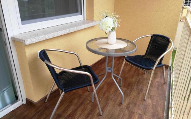 Aqualiget-Apartmanház