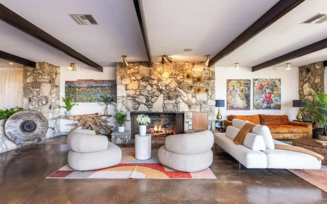 Stylish Hillside Retreat with Pool & Views