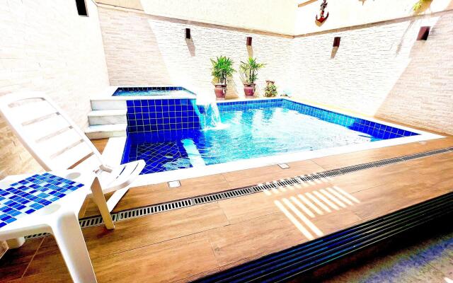 Piscina com ofurô/Churrasqueira/Sinuca e Ping Pong