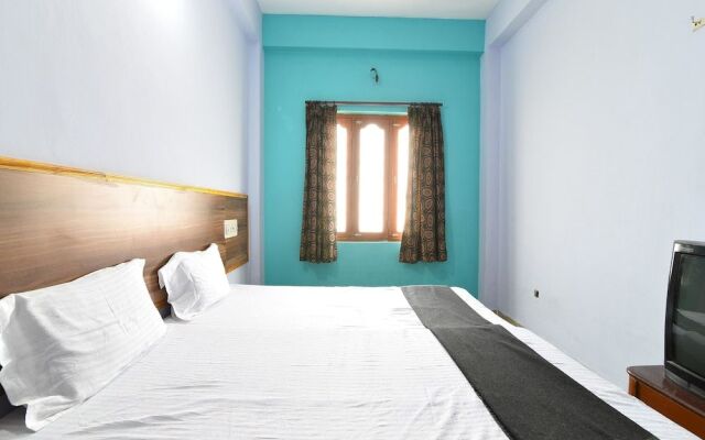 SPOT ON 39866 Hotel Dhruvathara
