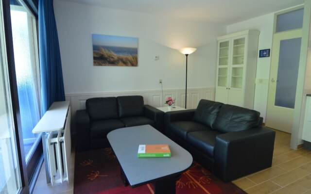 Apartment in Nieuwvliet with Roof Terrace, Garden, Parking