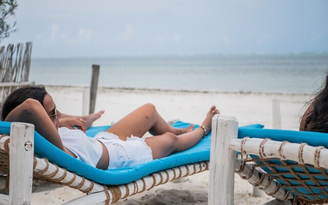 Neema Barefoot Beach House