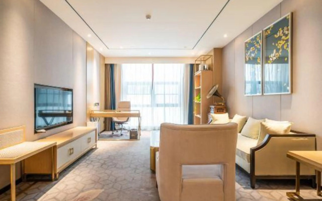 Xinzheng Xingangwanhua Hotel