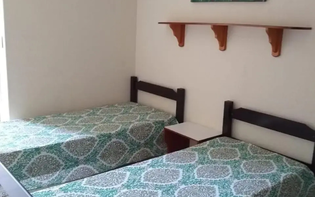 1 quarto 2 camas de solteiro