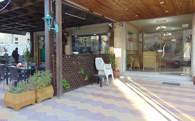 Al-Nujoom Hotel Suites
