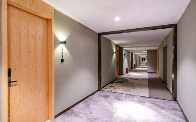 Xinyue Hotel (Liaobu Wanrun Plaza)