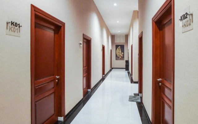Super Oyo Capital O Papakoel Hotel & Cafe