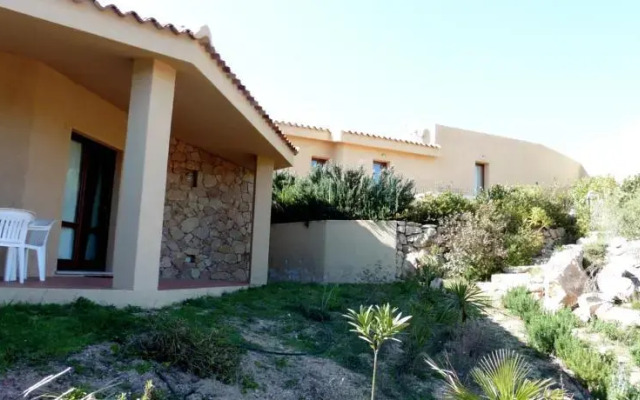 Holiday homes Li Streghi by swimming pool