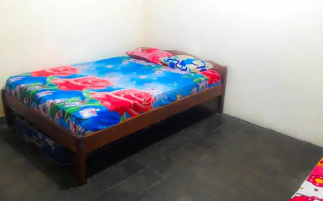 Losmen 2000 Tiga