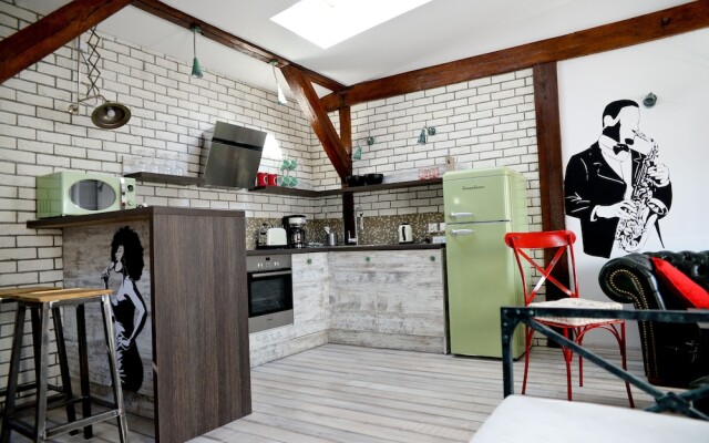 In the Attic Apartments