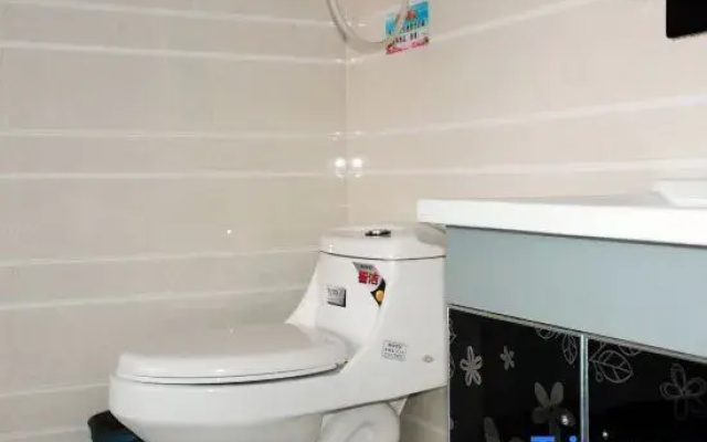Home Huayi Hotel (Mudanjiang Normal University)