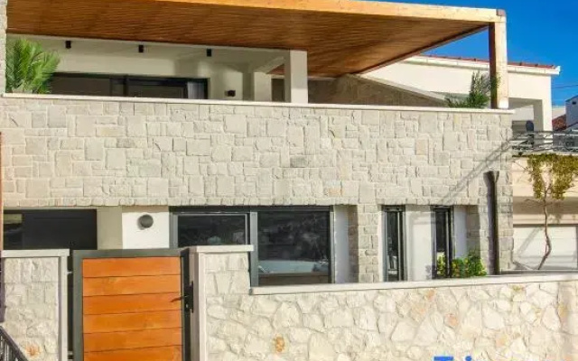 Seafront villa Kupinica with private indoor Pool