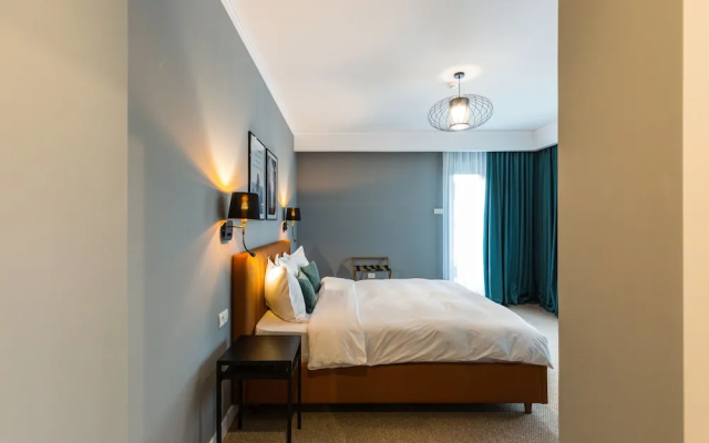 Отель UpperHouse Suites & More