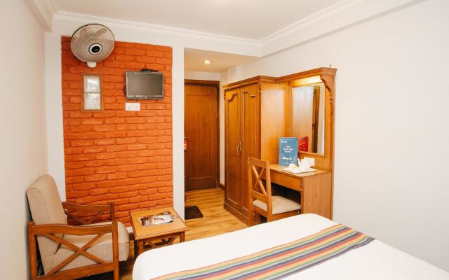 Osho Holiday Inn by OYO Rooms