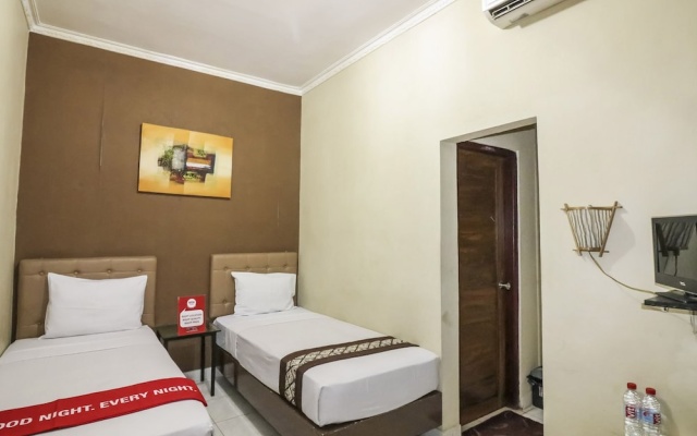 NIDA Rooms Selokan Mataram Depok – Guest Rooms – Sleman