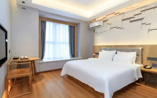 Kelton Wisdom Hotel (Jinjiang Wudian City Wanda Plaza)