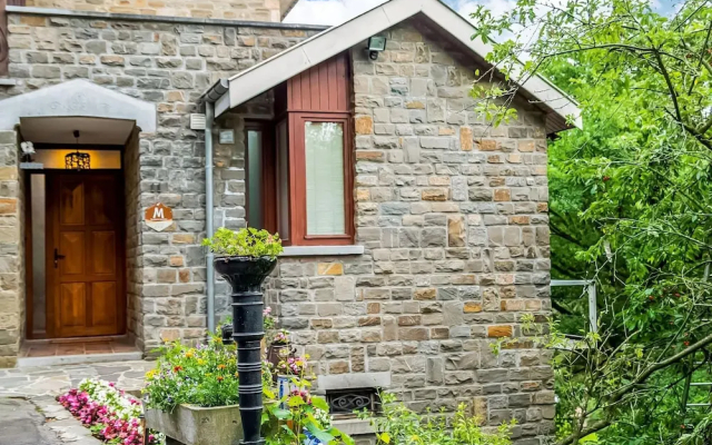 A Small Studio of a Nature Stone House