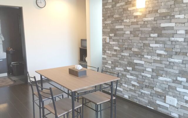 Condominium Kuebu