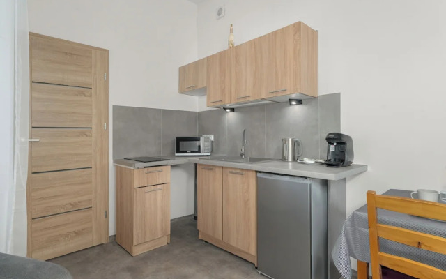 Grey and Beige Poznan Studio by Renters