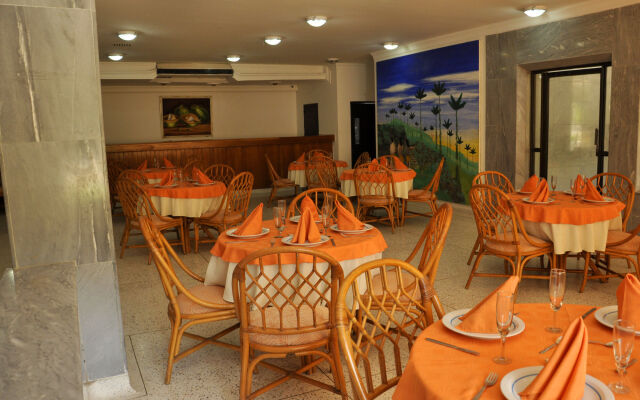 Axis Inn by GEH Suites Hotel