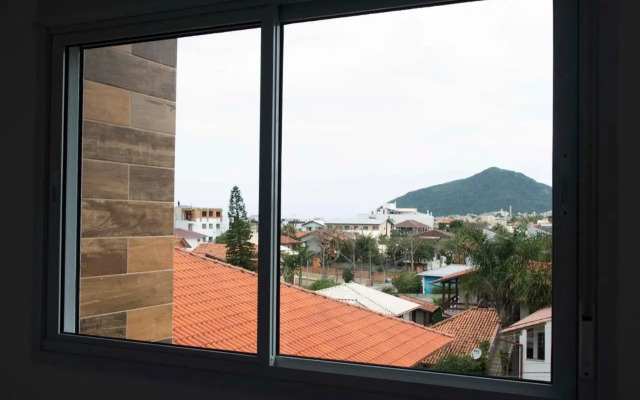 Ambiente Descolado 100m da praia e piscina