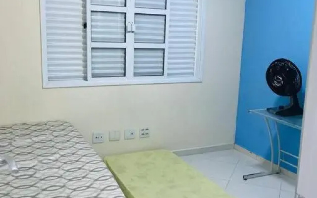 Casa de praia com piscina e churrasqueira - Indaiá Bertioga