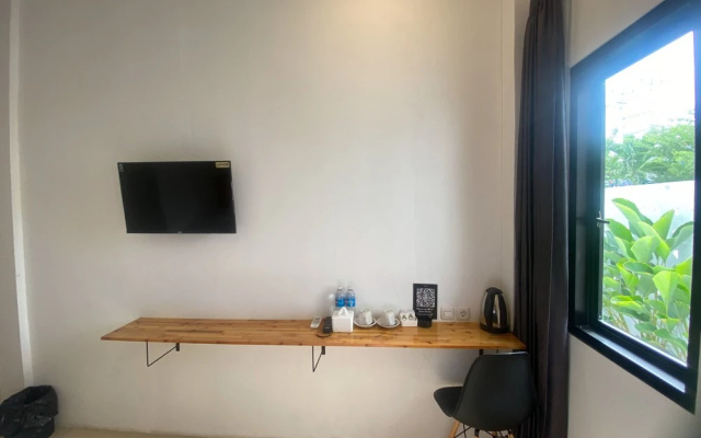 Urbanview Hotel Medio Inn Palu By Reddoorz – Guest Rooms – Palu